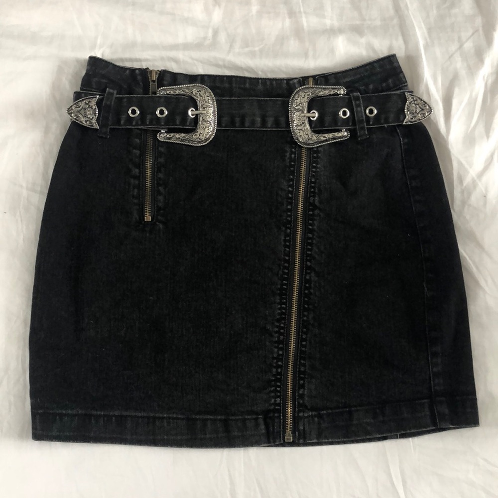 Distressed black denim asymmetric zipper skirt